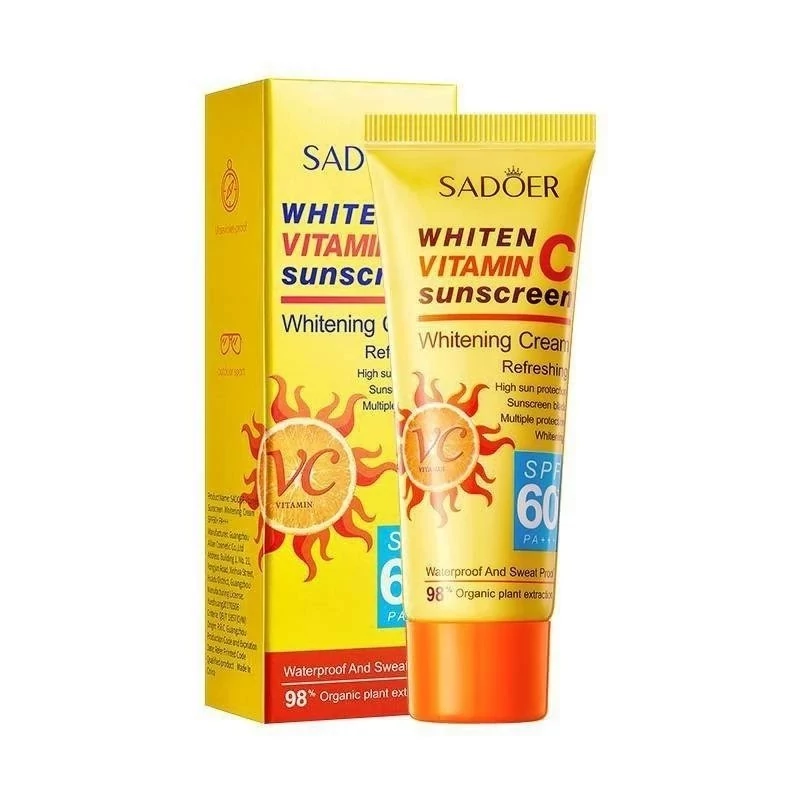 کرم ضد آفتاب بدون رنگ صورت و بدن سادور spf60 مدل ویتامین سی محافظ UVA،UVB مناسب برای انواع پوست وزن 50 گرم