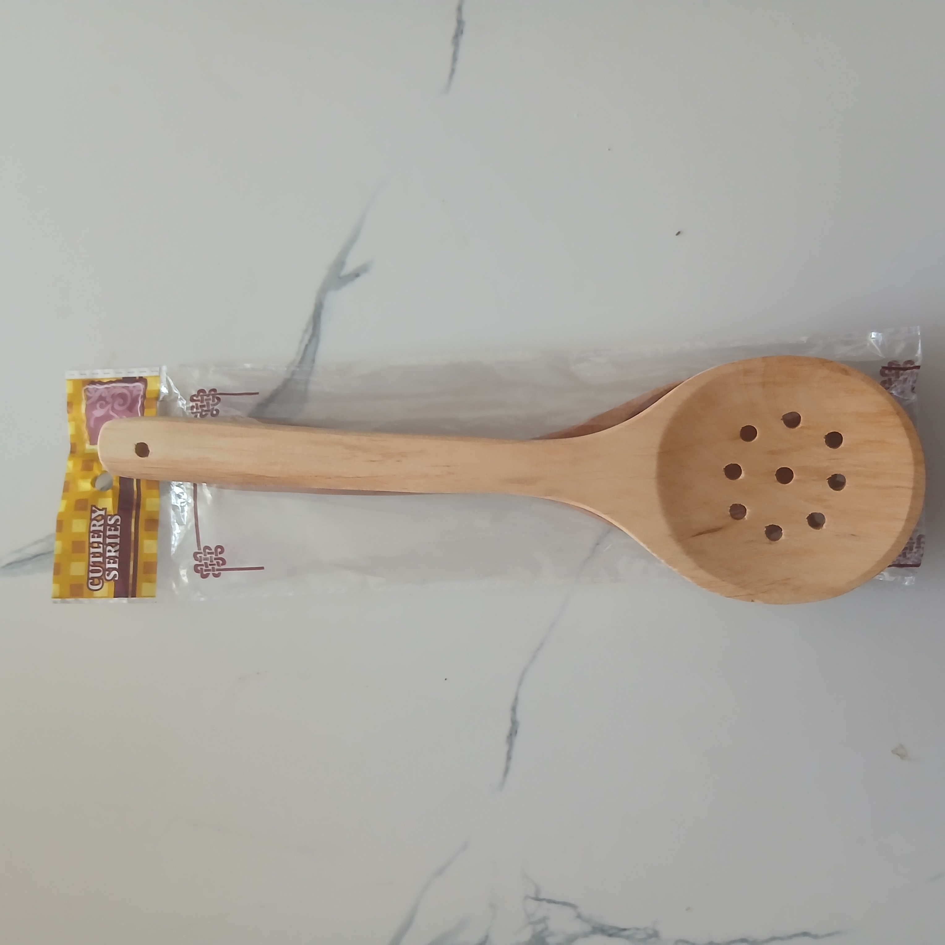 کفگیر چوبی گرد سوراخ دار