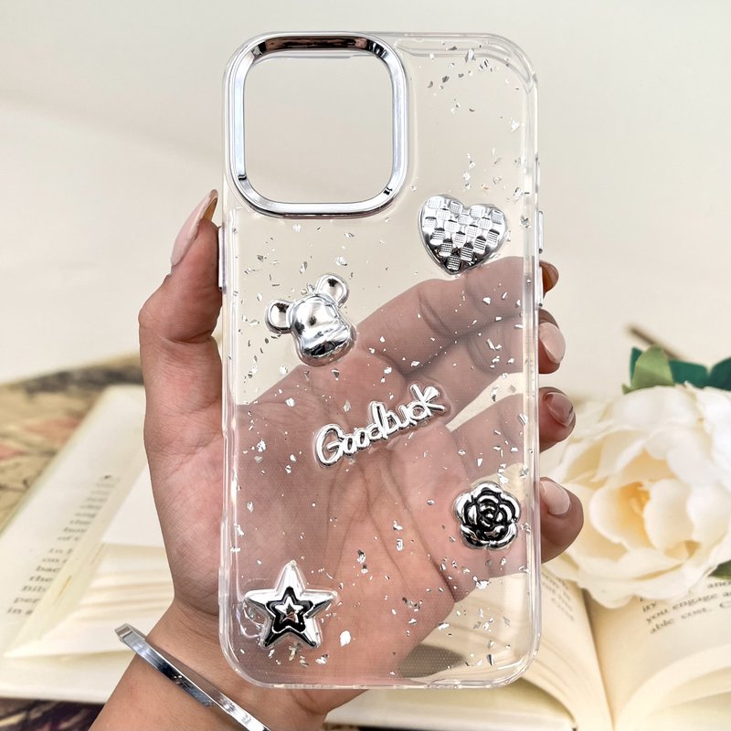 قاب گوشی iPhone 16 Pro Max آیفون Silver Crystal شفاف شاین لوکس طرح Good Luck لنز نقره ای کد 570306