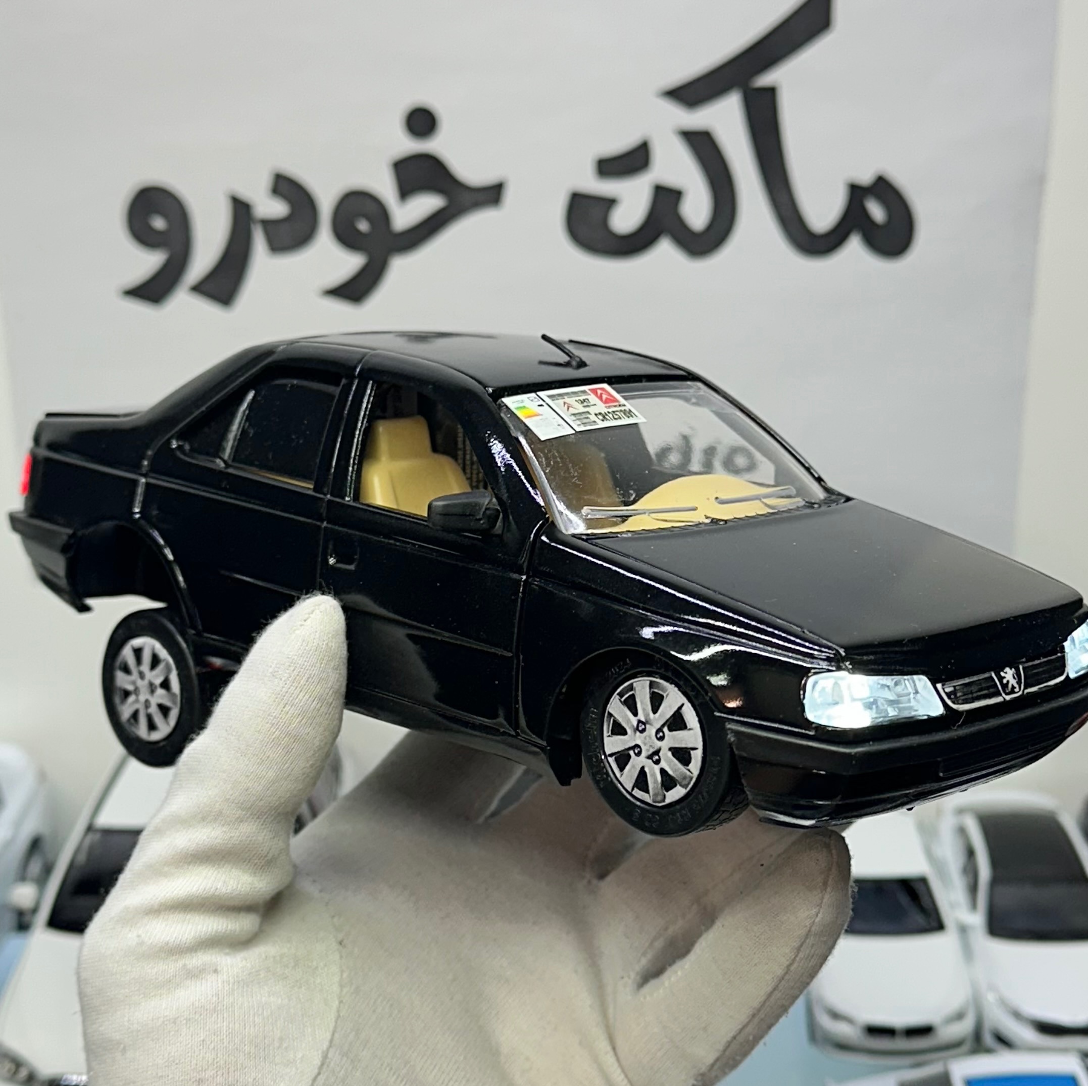 ماکت پژو SLX مشکی داخل کرم 
