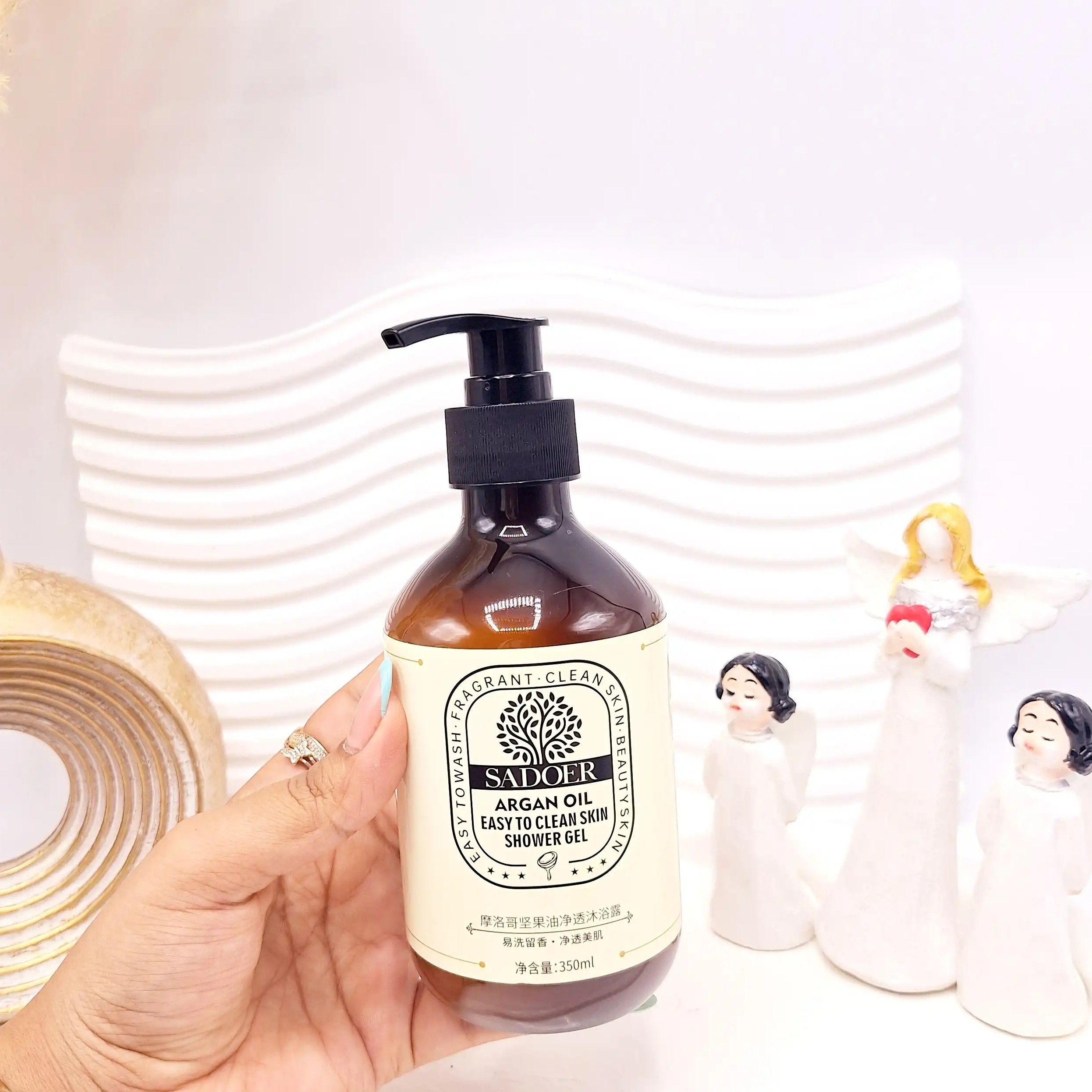 شاور ژل تمیز کننده پوست بدن با عصاره روغن آرگان حجم 350m برند sador