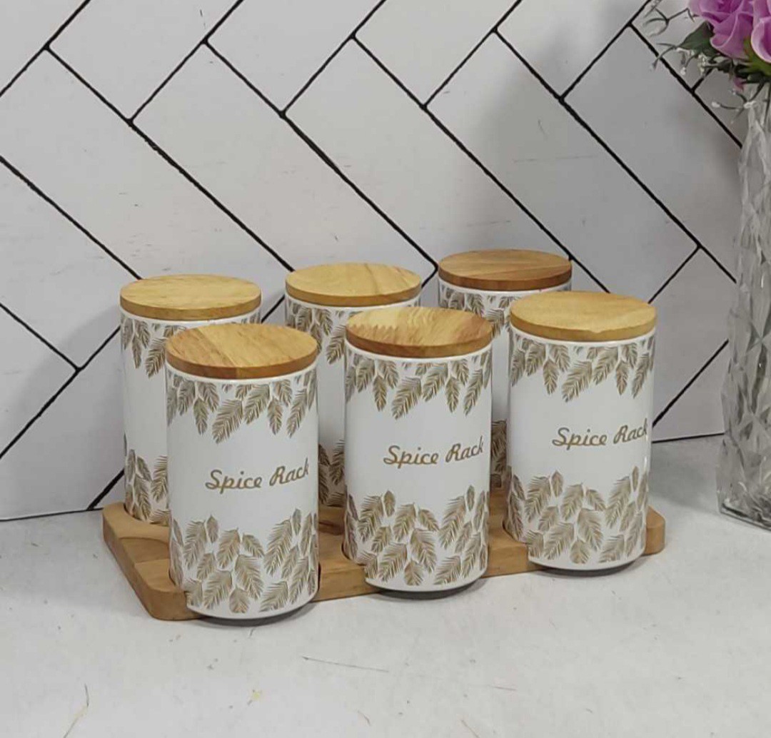 ست جا ادویه 7 پارچه سام ست درب چوبی طرح پر 40105054 (پسکرایه)